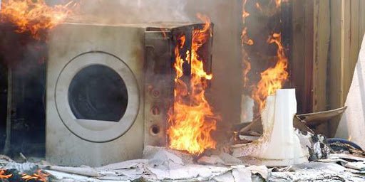 Dryer fully engulfed in flames