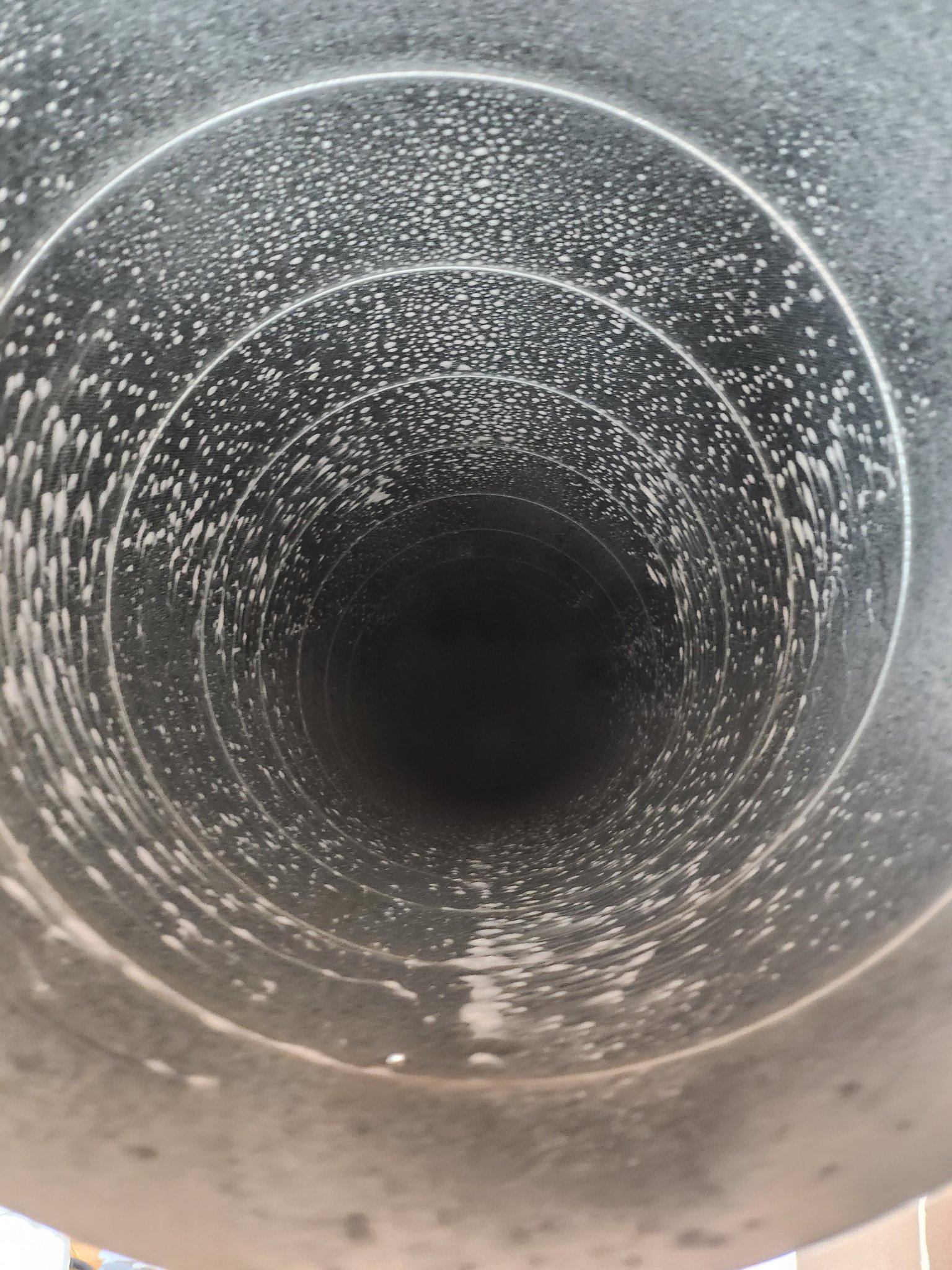 Sanitizing spray applied inside ductwork