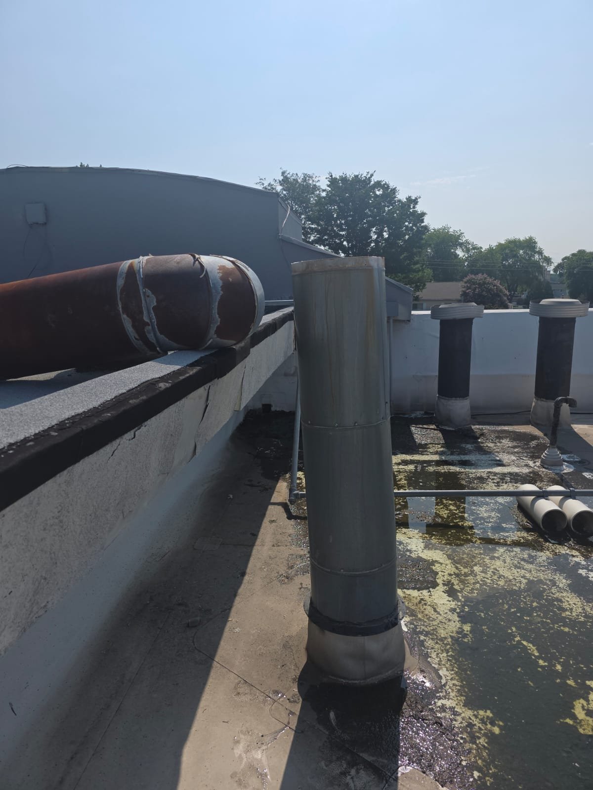 Row Of Commercial Dryers In A Laundromat