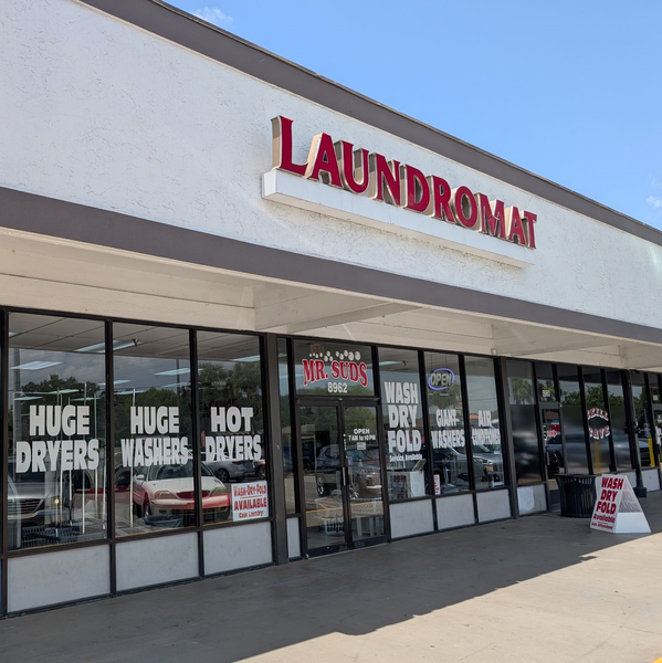 Laundromat Storefront With Wash Dry Fold Service