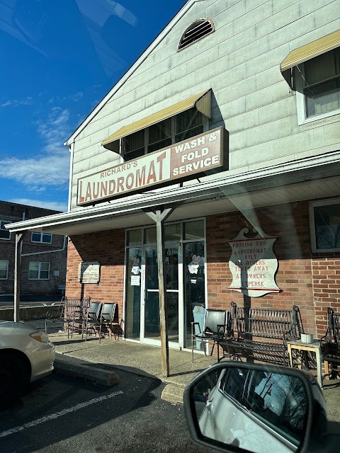 Laundromat Storefront With Wash And Fold Service