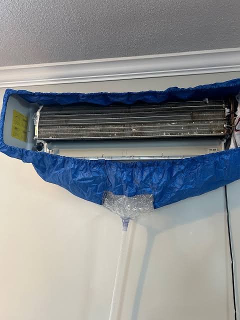 Mini-split with wash bag, dirty coil exposed
