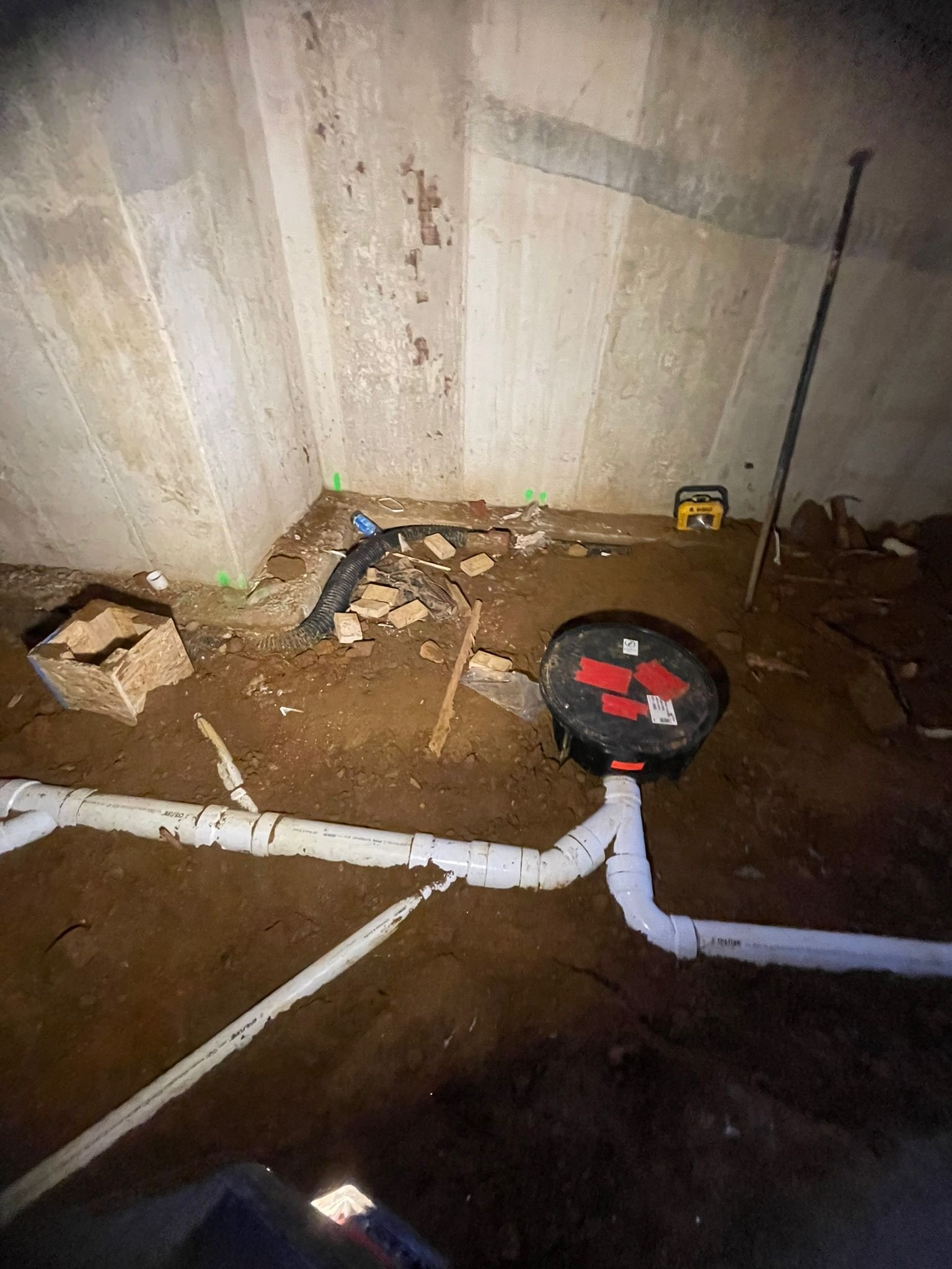 Rough-in plumbing with PEX lines in framing
