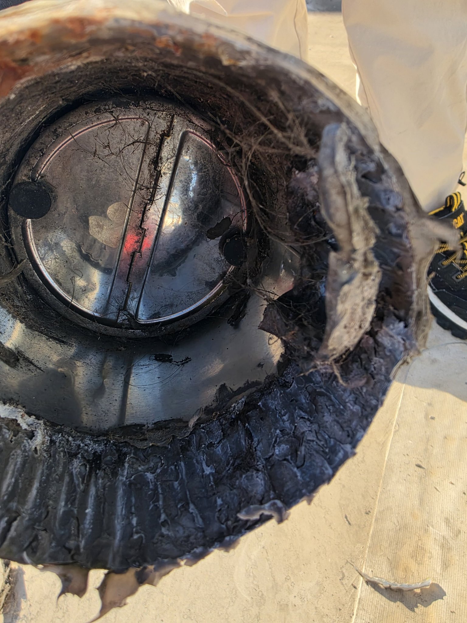 Salon Dryer Vent Damper Caked With Lint Before Cleaning