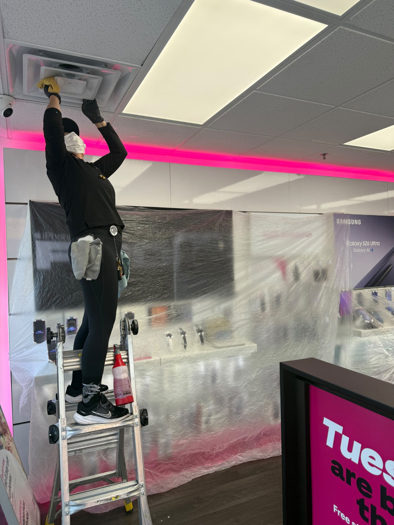 Technician cleaning a vent